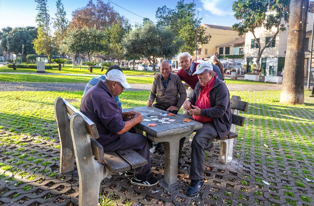 group of seniors playing cards