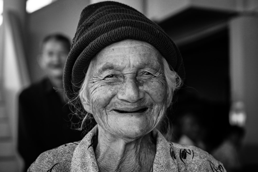 Happy elderly woman smiling warmly