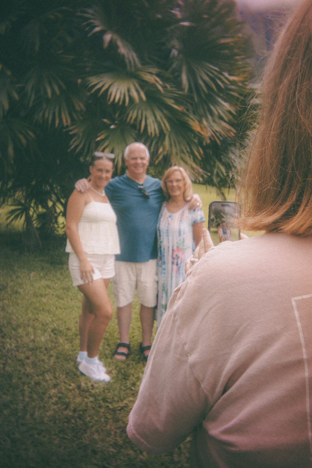 Group of joyful senior citizens laughing together outdoors