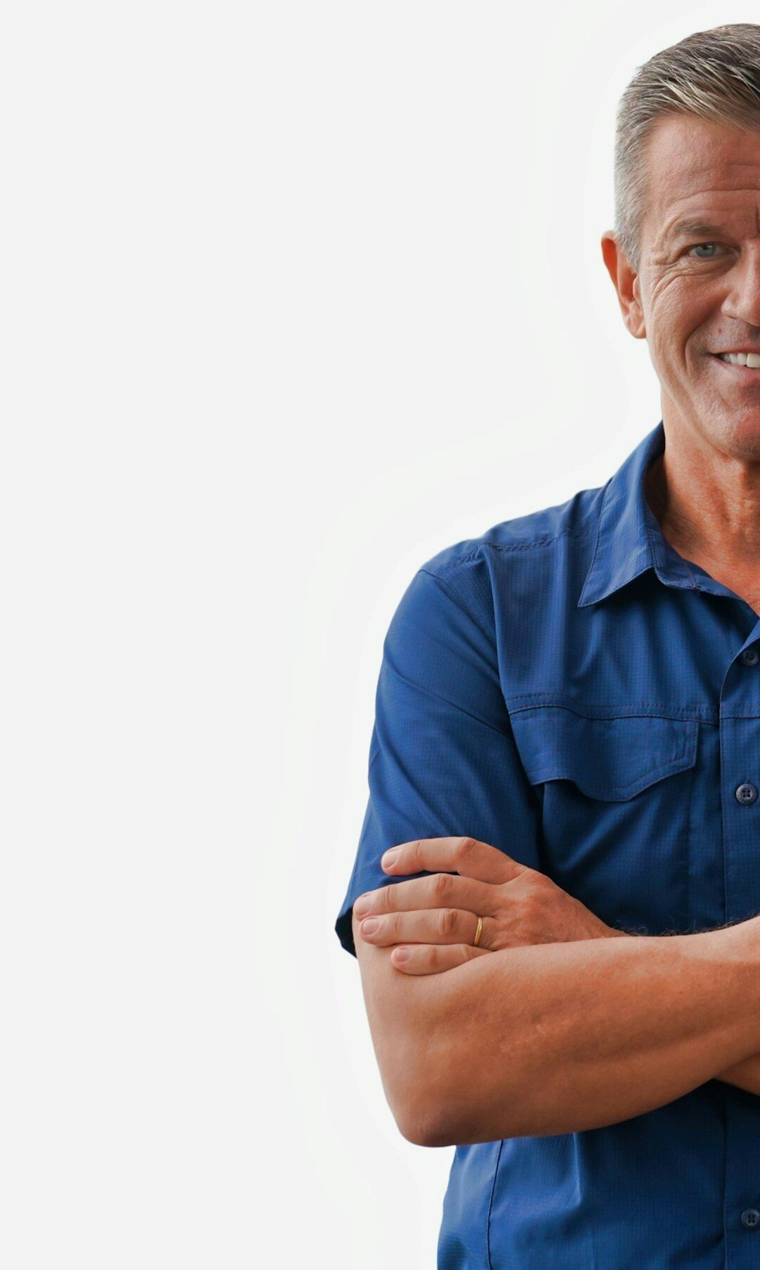 Friendly senior fitness instructor man smiling