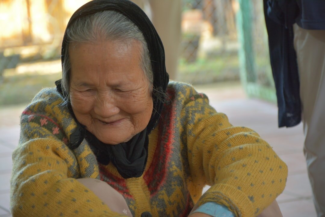 Elderly woman laughing joyfully
