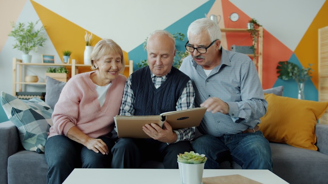 elderly people chatting in living room